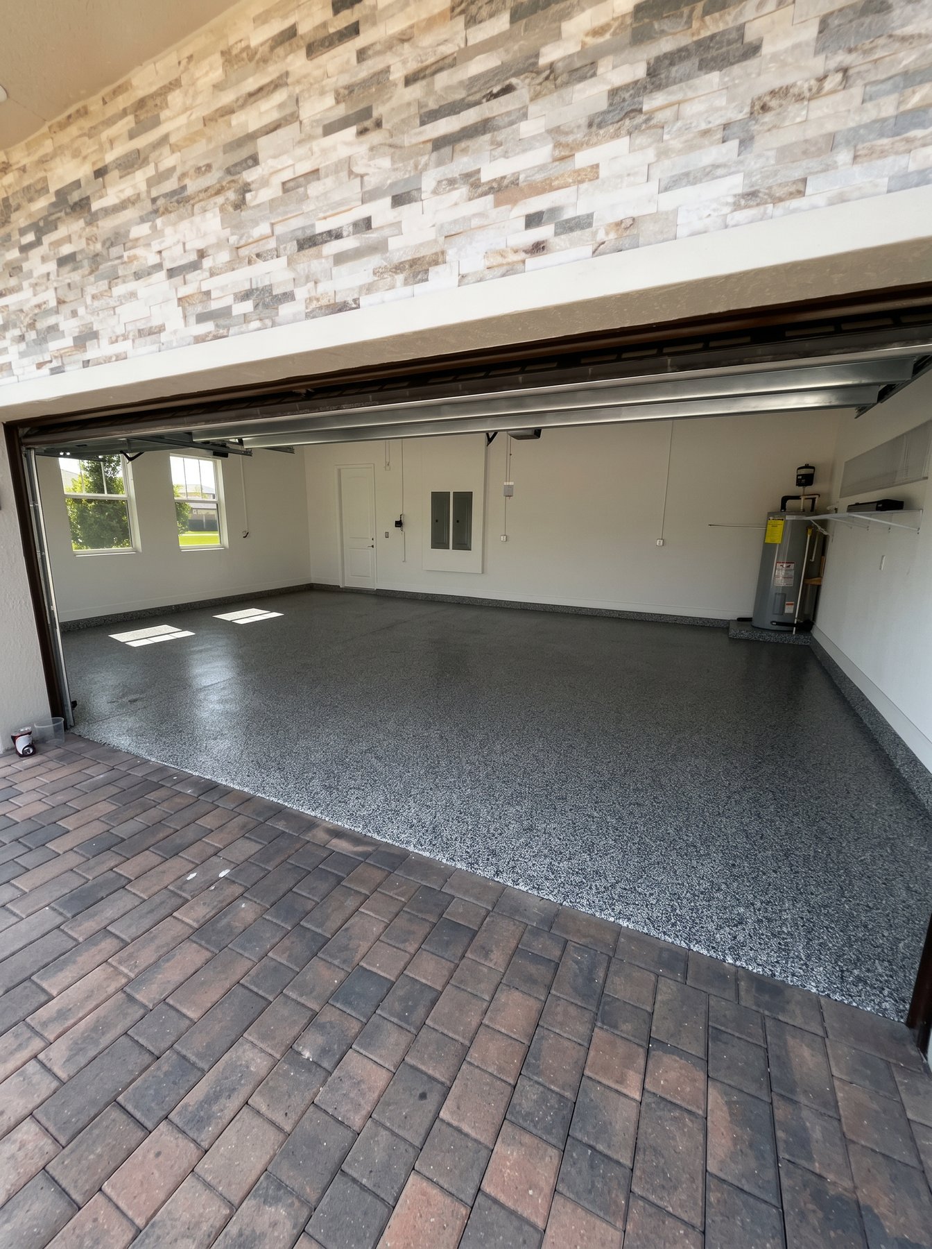 Flake epoxy garage floor installation by Art Epoxy Designs